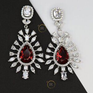 Imperial Blossom .925 Silver Earrings · Ruby CZ · Elegant Floral Design.